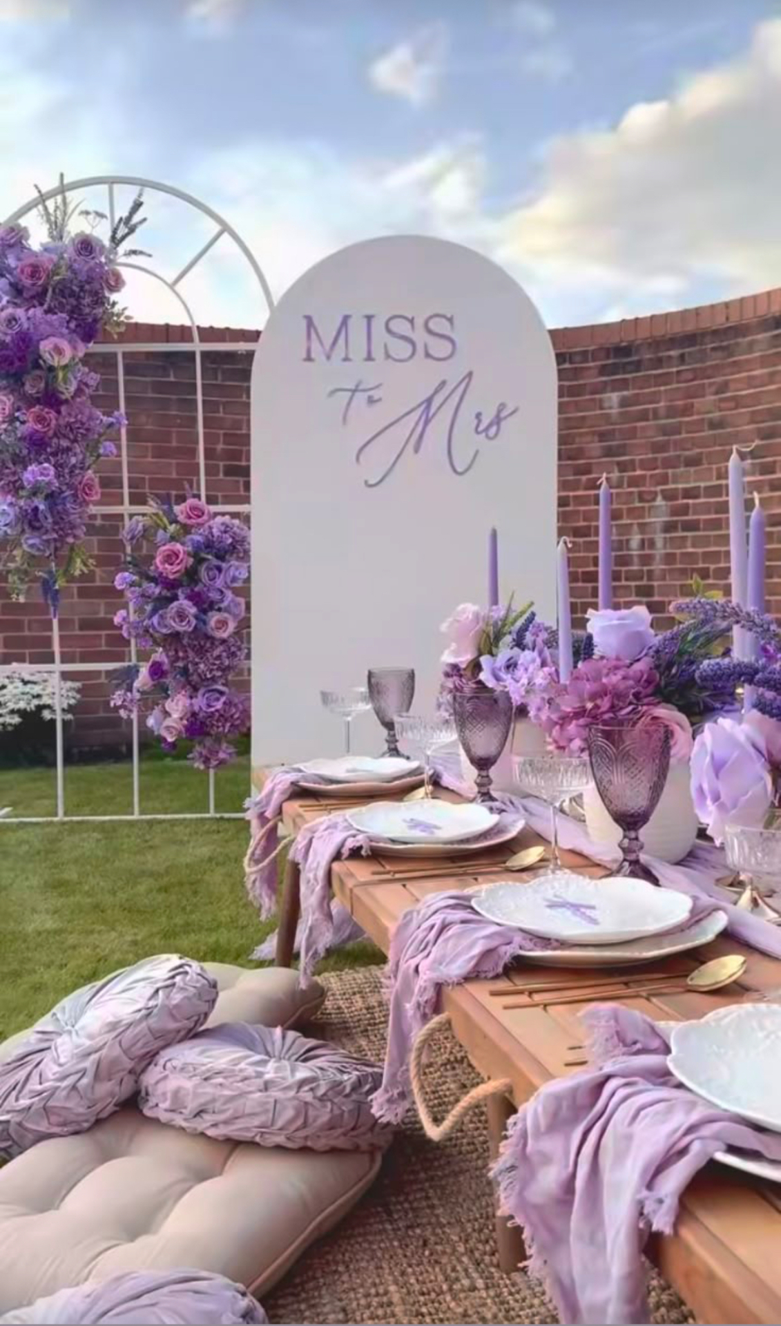 Miss to Mrs bridal shower tablescape with lavender florals and candles