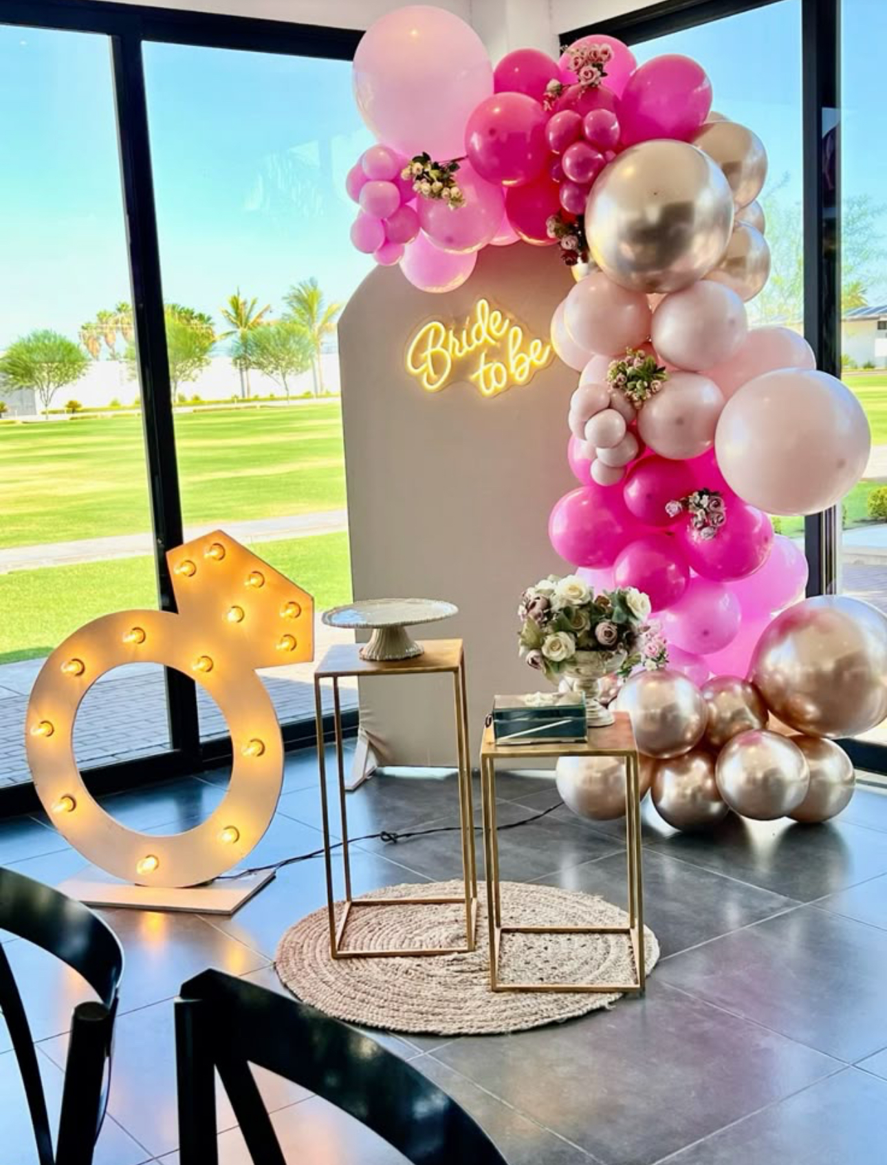 Bride to Be balloon arch with marquee ring and rose gold balloons
